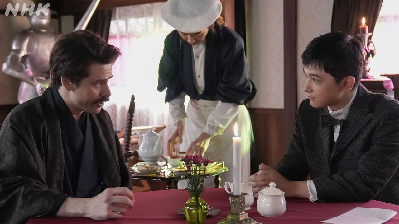 1/23(金)の「ばけばけ」トキ（髙石あかり）にそっけないサワ（円井わん）。一方、錦織（吉沢亮）は知事（佐野史郎）から自分の後任の英語教師について知らされる